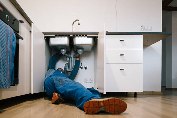 Professional Drain Cleaning technician working in Gateway, AK